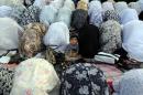 File picture shows Iranian Muslim women praying in western Tehran