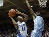 Duke's Rasheed Sulaimon (14) drives to the basket as North Carolina's Reggie Bullock (35) defends during the first half of an NCAA college basketball game in Durham, N.C., Wednesday, Feb. 13, 2013. (AP Photo/Gerry Broome)