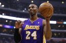 Los Angeles Lakers' Bryant reacts after being called for a foul during the first half of the Lakers' loss to the Los Angeles Clippers in their NBA basketball game in Los Angeles