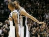 San Antonio Spurs' Gary Neal celebrates a 3-point basket at the first-half buzzer with teammate Manu Ginobili during Game 3 of their NBA Finals basketball series against the Miami Heat, Tuesday, June 11, 2013, in San Antonio. (AP Photo/Eric Gay)