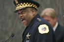 FILE - In this April 13, 2016, file photo, Eddie Johnson, left, speaks after being sworn in as the new Chicago police superintendent in Chicago. Superintendent Johnson says he will recommend the firing of seven officers involved in the Oct. 20, 2014 shooting death of black teenager Laquan McDonald. Superintendent Eddie Johnson said Thursday Aug. 18, 2016 he was accepting the recommendations of the city's inspector general who concluded that the officers filed false police reports. (AP Photo/M. Spencer Green, File)