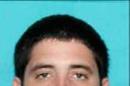 This photo released Wednesday, July 2, 2014 by New Orleans Police shows Justin Odom, named as a person of interest who is being sought in connection with a Sunday morning shooting on Bourbon Street in New Orleans, which left ten people wounded, two seriously. (AP Photo/New Orleans Police)