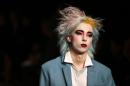 A model presents a creation by Charles Jeffrey Loverboy during the MAN catwalk show on the first day of the Autumn/Winter 2016 London Collections: Men fashion event in London on January 8, 2016