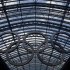 Olympic rings hang from the glass roof of St Pancras International Station in London