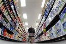 File photo of shopper walking down aisle in newly opened Walmart Neighborhood Market in Chicago