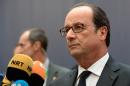 France's President Francois Hollande addresses journalists as he arrives for an European Union leaders summit on October 20, 2016 at the European Council, in Brussels