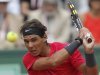 Rafael Nadal of Spain returns in his second round match against Denis Istomin of Uzbekistan at the French Open tennis tournament in Roland Garros stadium in Paris, Thursday May 31, 2012. (AP Photo/Bernat Armangue)