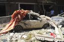 A view shows the wreckage after a car bomb exploded in the Jaramana district of southeast Damascus