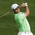 Paul Casey of England plays a ball on the 10th hole during the first round of the Desert Classic Golf tournament in Dubai, United Arab Emirates, Thursday, Jan. 31, 2013. (AP Photo/Kamran Jebreili)