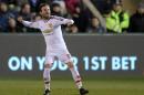 Manchester United's midfielder Juan Mata celebrates scoring his team's second goal during the English FA Cup fifth round football match between Shrewsbury Town and Manchester United in Shrewsbury, England on February 22, 2016