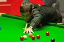 England's Ronnie O'Sullivan plays a shot during the 2014 World Snooker Championship final in Sheffield, northern England, on May 5, 2014
