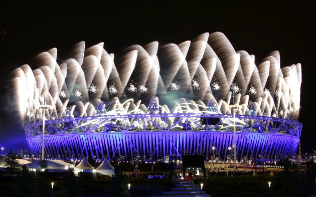 Fireworks explode over the Olympic Stadium during the opening ceremony of the London 2012 Olympic Games