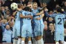 Manchester City's Aleksandar Kolarov, 2nd right, and his teammates celebrate their side's 3rd goal scored by Ilkay Gundogan during the Champions League group C soccer match between Manchester City and Barcelona at the Etihad stadium in Manchester, England, Tuesday, Nov. 1, 2016. (AP Photo/Rui Vieira)