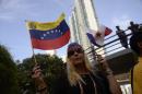 Venezuelan citizens protest in Panama City on April 8, 2015, two days before the opening of the Summit of the Americas
