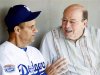 File photo of Los Angeles Dodgers head coach Torre talking to Garagiola Sr. before playing the Chicago White Sox in a MLB spring training game in Glendale
