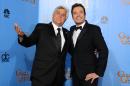 FILE - This Jan. 13, 2013 file photo shows Jay Leno, left, and Jimmy Fallon backstage at the 70th Annual Golden Globe Awards in Beverly Hills, Calif. Fallon will lead top comedians in saluting his 