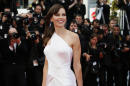 Actress Hilary Swank poses as she arrives for the screening of The Homesman at the 67th international film festival, Cannes, southern France, Sunday, May 18, 2014. (AP Photo/Alastair Grant)