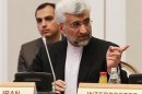 Iran's Supreme National Security Council Secretary and chief nuclear negotiator Jalili gestures during talks on Iran's nuclear programme in Almaty