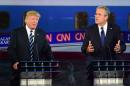 Republican presidential hopefuls Donald Trump (left) and Jeb Bush argue during a presidential debate in Simi Valley, California, on September 16, 2015