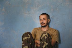 A captured Ukrainian border guard sits in a garage &hellip;