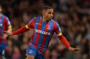 Crystal Palace's midfielder Jason Puncheon celebrates scoring their second goal during the English Premier League football match against Manchester City in south London on April 6, 2015