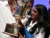 Snigdha Nandipati, 14, of San Diego, holds the trophy after winning the National Spelling Bee with the word "guetapens" Thursday, May 31, 2012 in Oxon Hill, Md. (AP Photo/Alex Brandon)