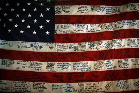 File photo of A U.S. flag with greetings from home decorating in an emergency room of the 28th Combat Support hospital in Baghdad