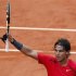 Nadal of Spain celebrates after winning his match against Schwank of Argentina during the French Open tennis tournament at the Roland Garros stadium in Paris