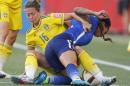 FILE - In this June 12, 2015, file photo, Sweden's Lina Nilsson (16) hauls down United States' Sydney Leroux (2) during second-half FIFA Women's World Cup soccer game action in Winnipeg, Manitoba, Canada. Sweden drew Group D, the so-called Group of Death, with the United States, Australia and Nigeria. The path certainly doesn't get any easier for coach Pia Sundhage's fifth-ranked team, who will face top-ranked Germany to open the knockout stage at the Women's World Cup. (John Woods/The Canadian Press via AP, File) MANDATORY CREDIT