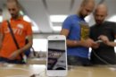 An Apple iPhone 5 is displayed in an Apple store in Rome