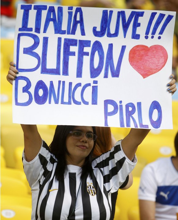 A fan of Italy holds a sign before the team&#39;s Confederations Cup Group A soccer match against Mexico at the Estadio Maracana in Rio de Janeiro