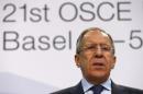 Russia's Foreign Minister Sergei Lavrov speaks during a news conference at a meeting of foreign ministers in Basel