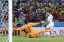 Costa Rica's Marco Urena, right, gets the ball past Uruguay's goalkeeper Fernando Muslera (1) to score Costa Rica's third goal during the group D World Cup soccer match between Uruguay and Costa Rica at the Arena Castelao in Fortaleza, Brazil, Saturday, June 14, 2014. (AP Photo/Natacha Pisarenko)
