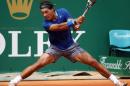 Rafael Nadal of Spain returns the ball to his compatriot David Ferrer during their quarter-final match at the Monte Carlo Masters in Monaco