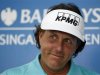 Mickelson of the U.S. smiles during a news conference ahead of the Barclays Singapore Open golf tournament in Singapore