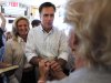Republican presidential candidate former Massachusetts Gov. Mitt Romney, center, greets State Rep. Norma Champagne, R-Manchester, right, as his wife Ann, left, looks on during a campaign stop at Robies Country Store, in Hooksett, N.H., Monday, Oct. 10, 2011.  (AP Photo/Steven Senne)