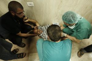 A Palestinian, wounded in an Israeli air strike on &hellip;