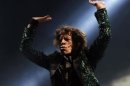 Mick Jagger of the Rolling Stones performs on the Pyramid Stage at Glastonbury music festival at Worthy Farm in Somerset, June 29, 2013. REUTERS/Olivia Harris