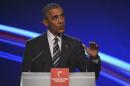 U.S. President Obama gestures as he makes a speach during the opening ceremony of the Hannover Messe in Hanover