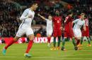England's Chris Smalling, left, celebrates after scoring during the International friendly soccer match between England and Portugal at Wembley stadium in London, England, Thursday, June 2, 2016 . (AP Photo/Frank Augstein)
