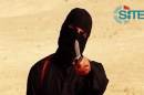 An image grab taken from a video released by the Islamic State group and identified by private terrorism monitor SITE Intelligence Group on September 2, 2014 purportedly shows a masked militant