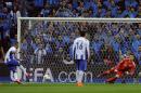 Porto's Ricardo Quaresma, left, scores the opening goal from the penalty spot past Bayern's goalkeeper Manuel Neuer, right, during the Champions League quarterfinal first leg soccer match between FC Porto and Bayern Munich at the Dragao Stadium in Porto, Portugal, Wednesday, April 15, 2015. (AP Photo/Paulo Duarte)