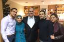 In a Monday, Jan. 18, 2016 photo provided by the Hekmati family, the family and U.S. Rep. Dan Kildee, D-Flint Township, Mich.,meet with former Iran prisoner Amir Hekmati, second from right, at Landstuhl Regional Medical Center in Landstuhl, Germany. From the left: brother-in-law Dr. Ramy Kurdi, sister Sarah Hekmati, Kildee, Amir Hekmati and sister Leila Hekmati. Amir Hekmati was detained in August 2011 on espionage charges. (Courtesy of the Hekmati Family via AP)