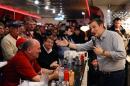 FILE - In this Jan 4, 2016 file photo, Republican Presidential candidate, Sen. Ted Cruz, R-Texas, campaigns at Penny's Diner in Missouri Valley, Iowa. Tea party flame-thrower Ted Cruz is showing voters his softer side during his presidential campaign in Iowa, whether through his joke-laced stump speech or one-on-one interactions. (AP Photo/Nati Harnik, File)