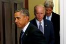 Obama arrives with Biden and Kerry to deliver a statement on the Keystone XL pipeline at the White House in Washington