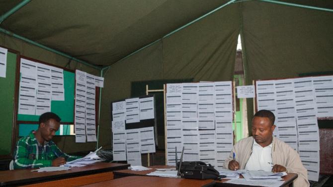 National Ethiopian Electoral Board employees tally votes from various regions at the National Ethiopian Electoral Board in Addis Ababa on May 27, 2015