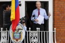 Wikileaks founder Julian Assange prepares to speak from the balcony of Ecuador's embassy, where he is taking refuge in London