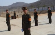 North Korean soldiers stand guard at the Tongchang-ri space center in North Phyongan Province in April 2012. US satellites have picked up signs that North Korea is preparing to launch a long-range missile, a Japanese newspaper reported on Friday