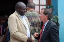 Martin Kobler (R), head of the United Nations mission in the DR Congo, speaks with mayor of Beni Masumbuko Nyonyi Bwanakawa (L) on October 23, 2014 in Beni