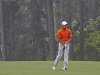 Amateur Guan Tianlang, of China, watches his ball after hitting in the rain on the eighth fairway during the second round of the Masters golf tournament Friday, April 12, 2013, in Augusta, Ga. (AP Photo/David J. Phillip)